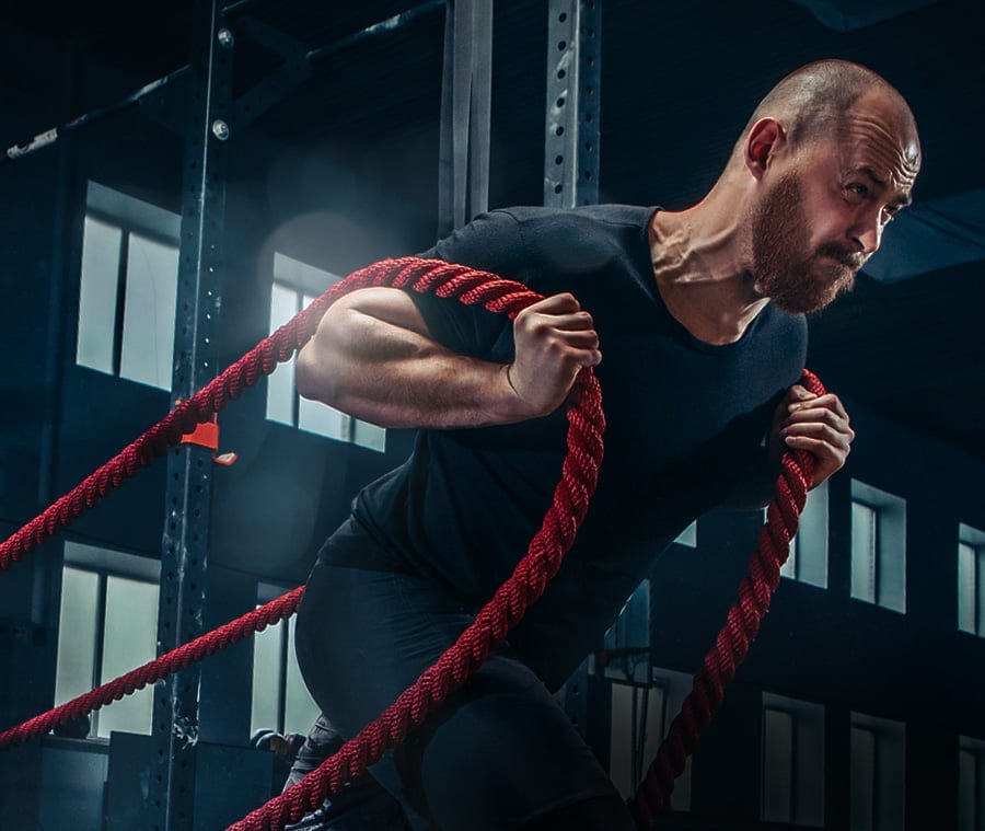 men with battle rope battle ropes exercise in the A4RHGPQ